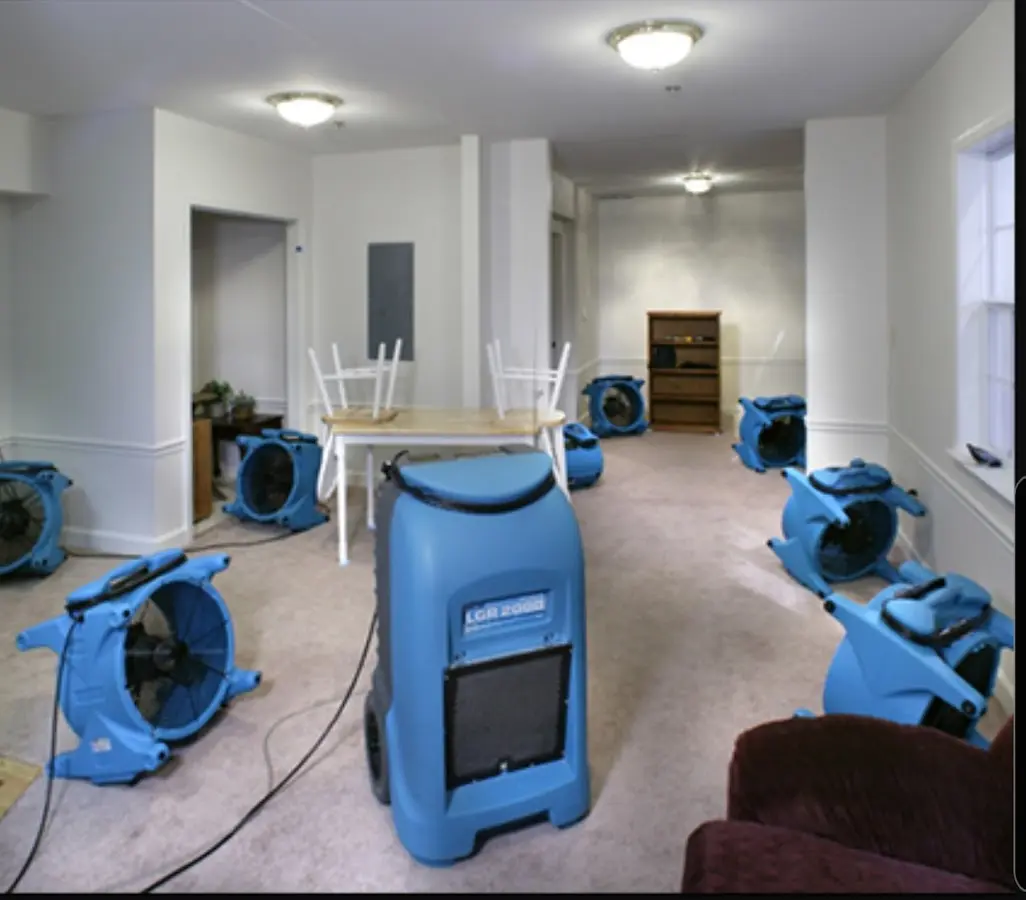 Air movers and dehumidifier setup for Water Damage Restoration in Freeport